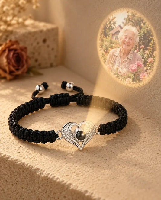 Angel Wing Heart Photo Projection Bracelet with Picture Inside - projecting the hidden photo onto a wall