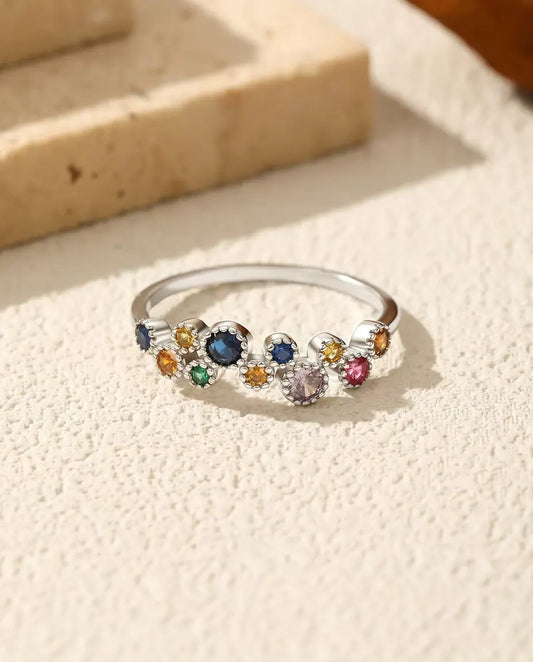 Colourful zirconia cluster ring with milgrain halos in 925 silver