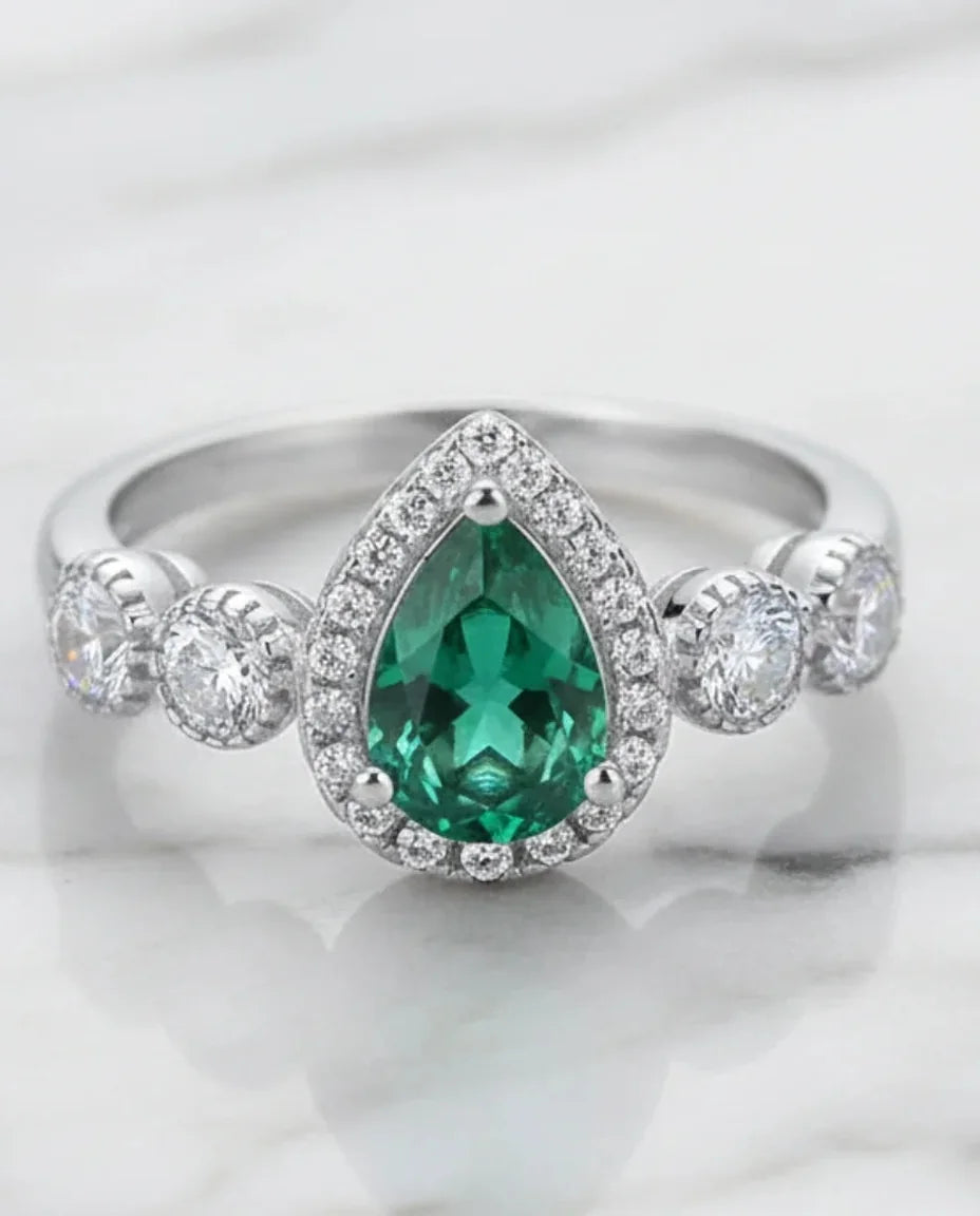 Lab grown pear cut emerald ring in 925 sterling silver