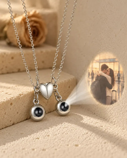 Personalised Photo Projection Couple Necklace Set of 2 - projecting the hidden photo onto a wall