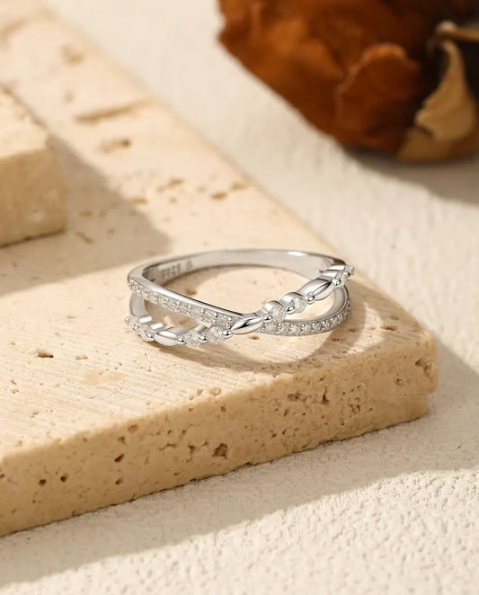 Moissanite crossover twist ring in 925 sterling silver