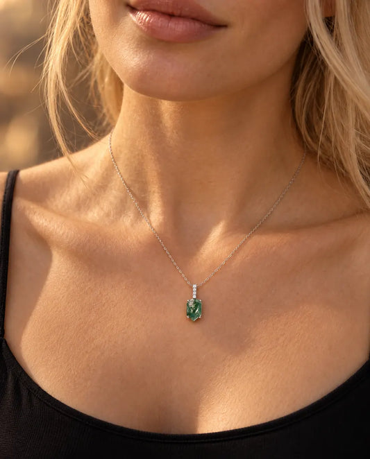 Moss Agate Shield Pendant Necklace in 925 Sterling Silver - worn on a model, close-up at the collarbone