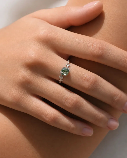 Moss agate vine leaf adjustable ring in sterling silver with round rose-cut stone and sculpted leaf band