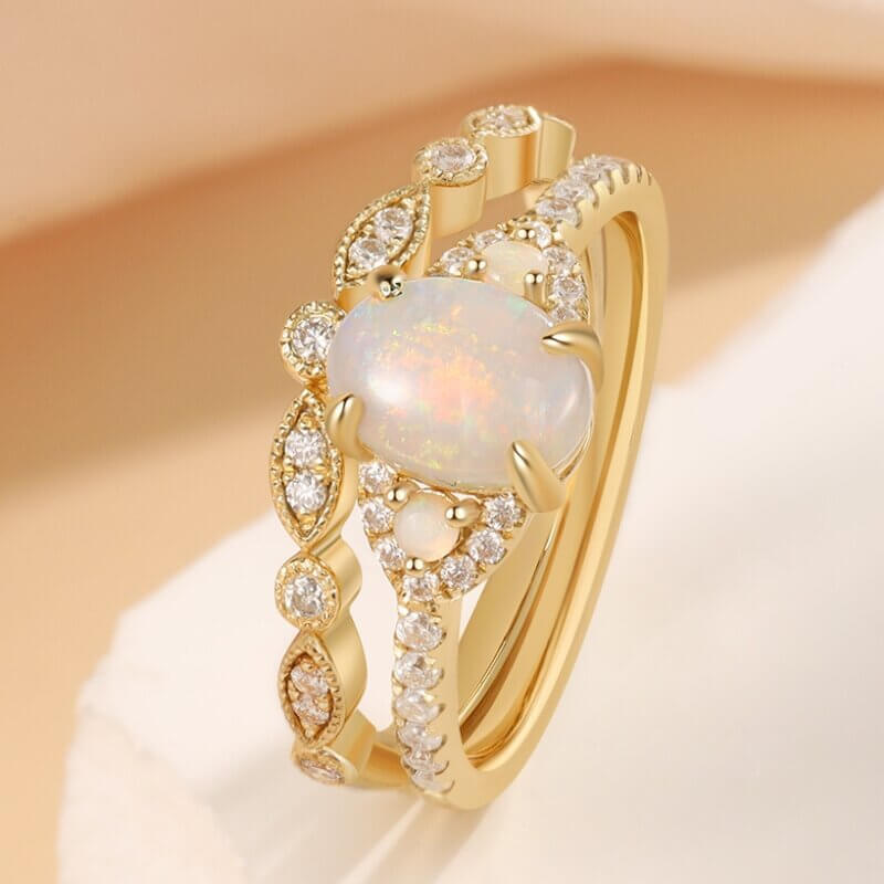 Oval Shaped Opal Engagement Ring Set with Moissanite