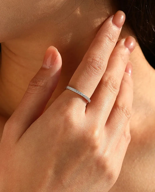 Pavé moissanite wedding band in 925 sterling silver with round D colour stones