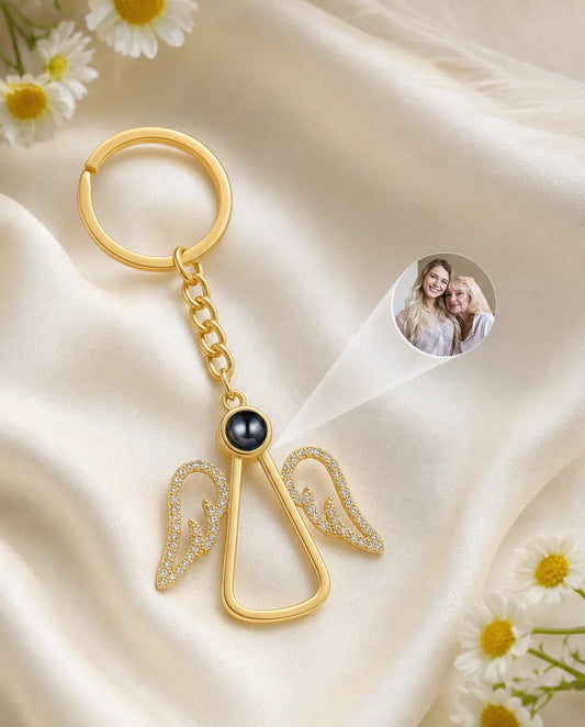 Angel photo projection keyring casting a personalised picture of a mother and daughter