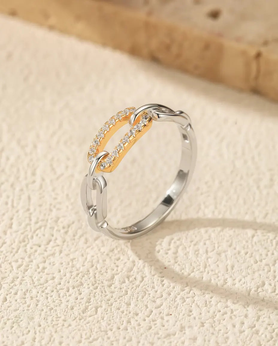 Two tone chain link ring in 925 sterling silver with a gold tone pave bar
