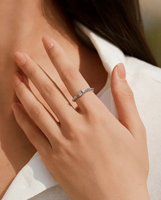 Adjustable beaded moissanite ring in 925 sterling silver with two round D colour stones