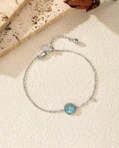 Blue checkerboard cut zirconia bolo slider bracelet in 925 sterling silver