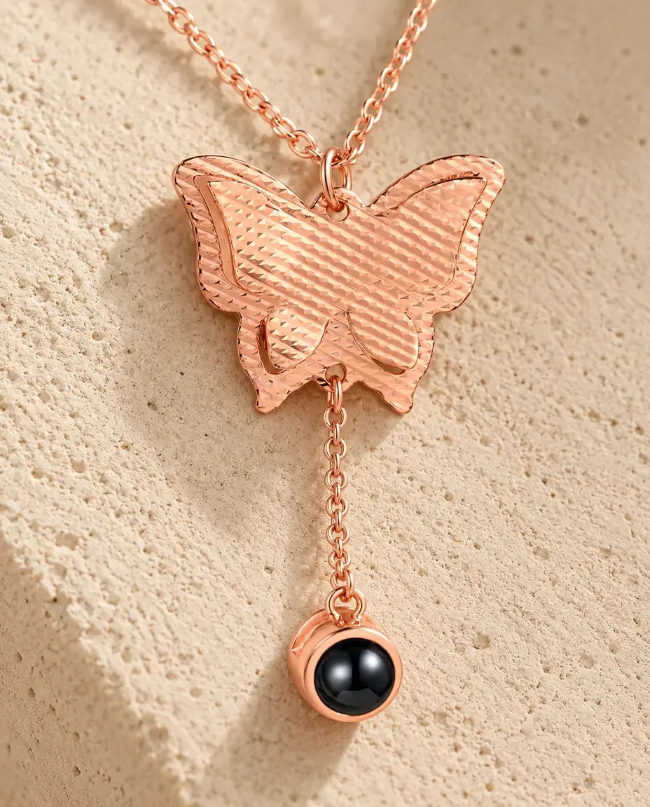 Personalised Butterfly Photo Projection Necklace - close-up of the projection charm