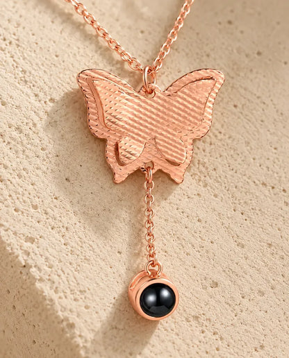 Personalised Butterfly Photo Projection Necklace - close-up of the projection charm