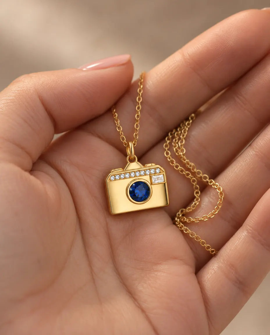 Personalised Camera Photo Locket Necklace That Holds 2 Pictures held in hand