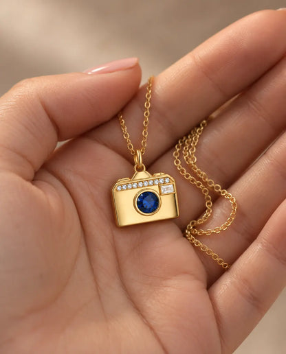 Personalised Camera Photo Locket Necklace That Holds 2 Pictures held in hand