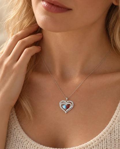 Blonde woman wearing the personalised double heart birthstone necklace