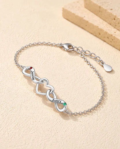 Personalised Infinity Bracelet With 2 Names - Double Infinity and Heart With Two Simulated Birthstones - three-quarter view