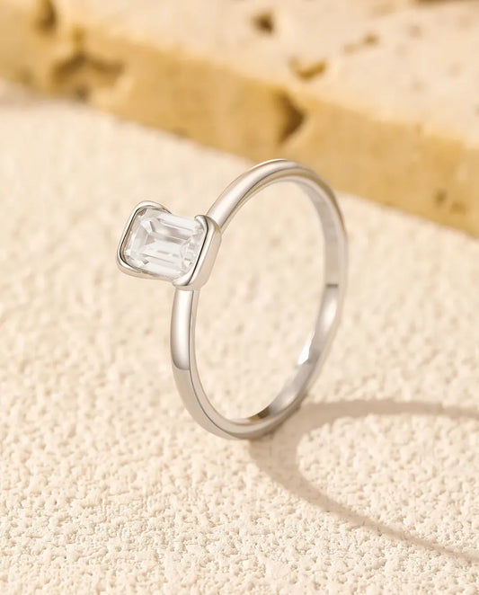 Emerald cut moissanite engagement ring in 925 sterling silver