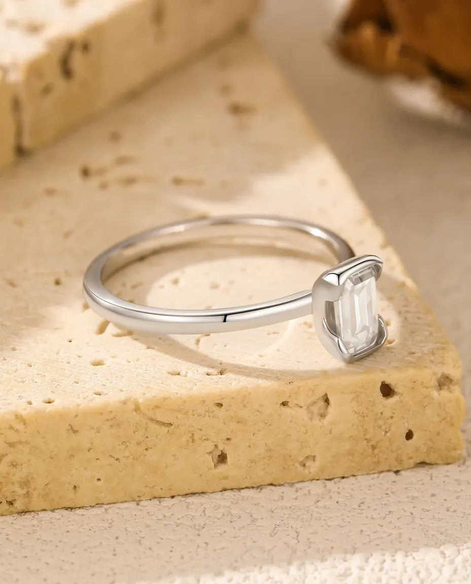Emerald cut moissanite engagement ring in 925 sterling silver