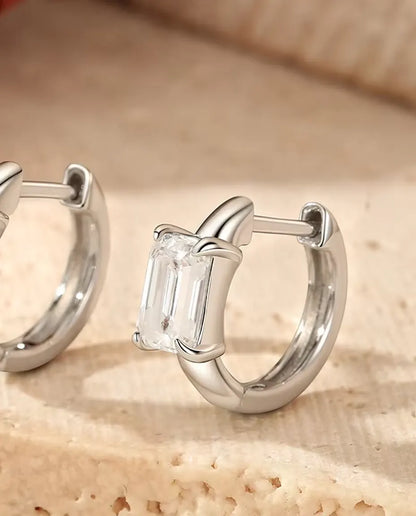 Emerald cut moissanite huggie earrings in 925 sterling silver
