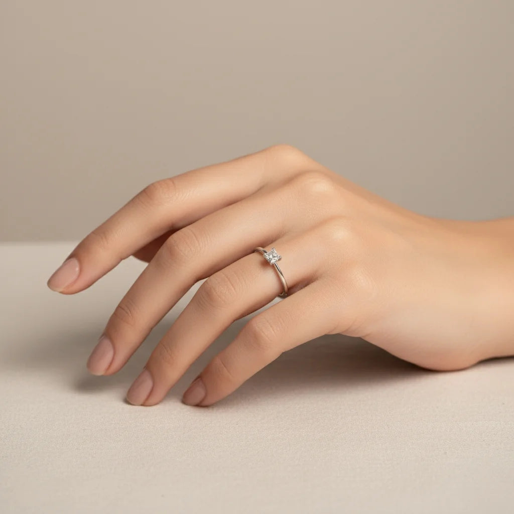 Emerald Cut Moissanite Solitaire Ring in Sterling Silver