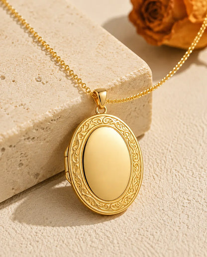 Engravable oval photo locket necklace in gold tone