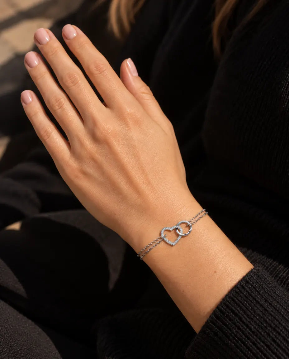 Personalised Interlocking Heart Bracelet - worn on the wrist, close-up