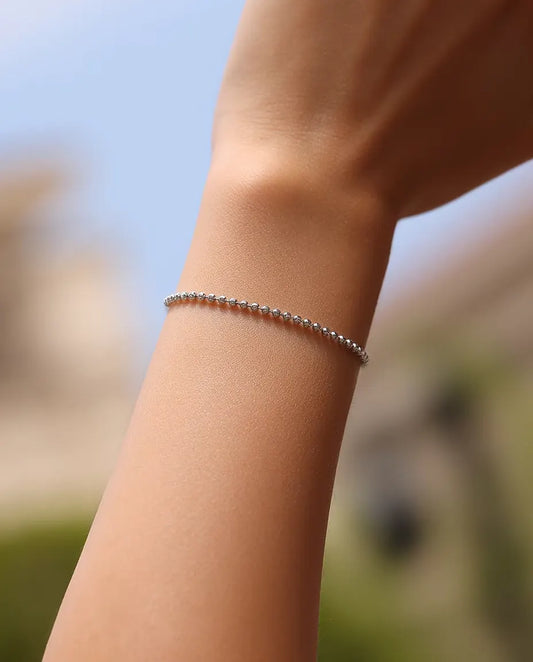 Faceted Bead Bracelet in 925 Sterling Silver - worn on the wrist outdoors