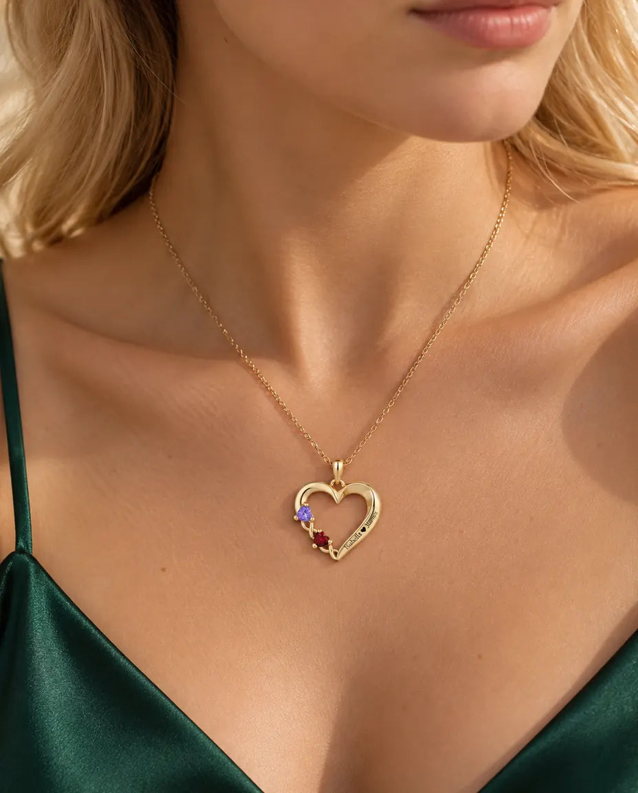 Blonde woman wearing the gold open heart birthstone name necklace