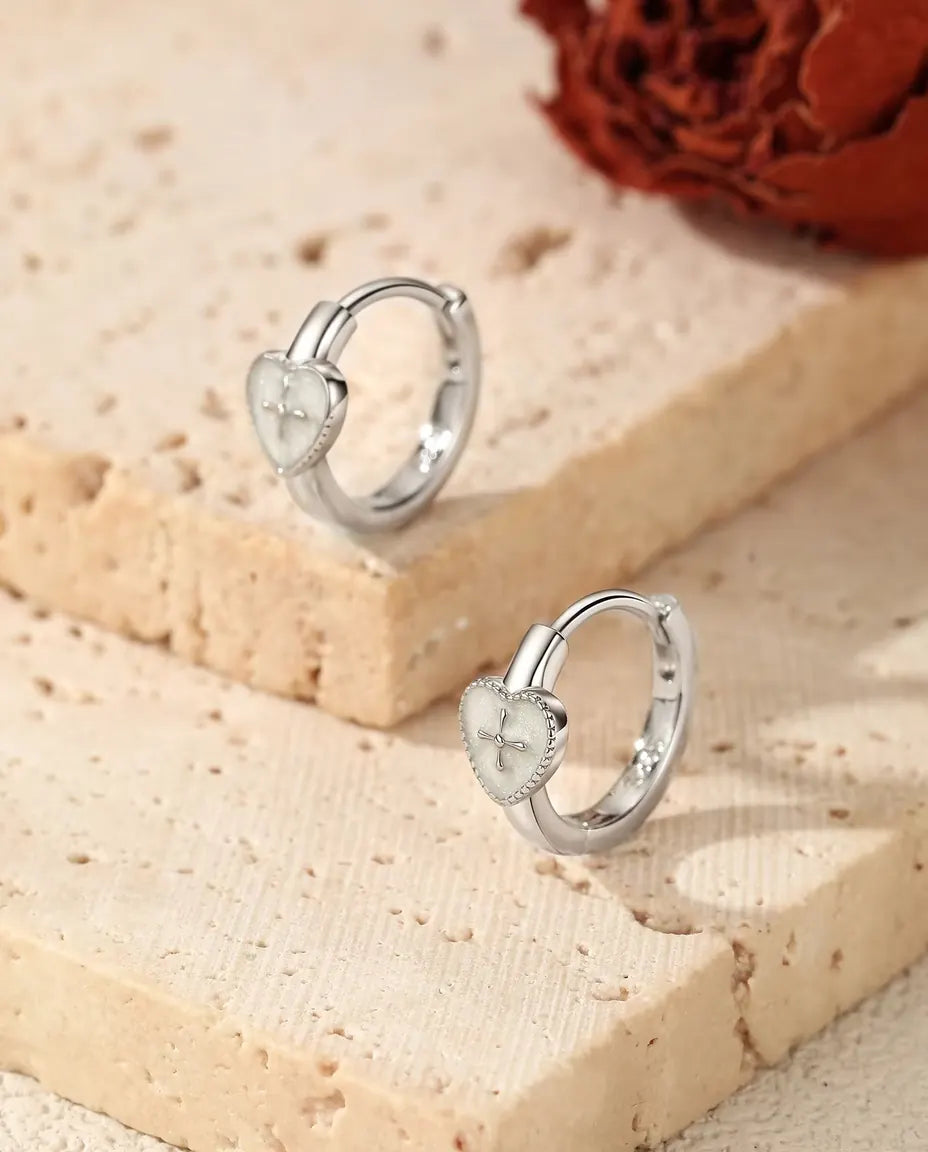 Heart cross huggie earrings in 925 sterling silver
