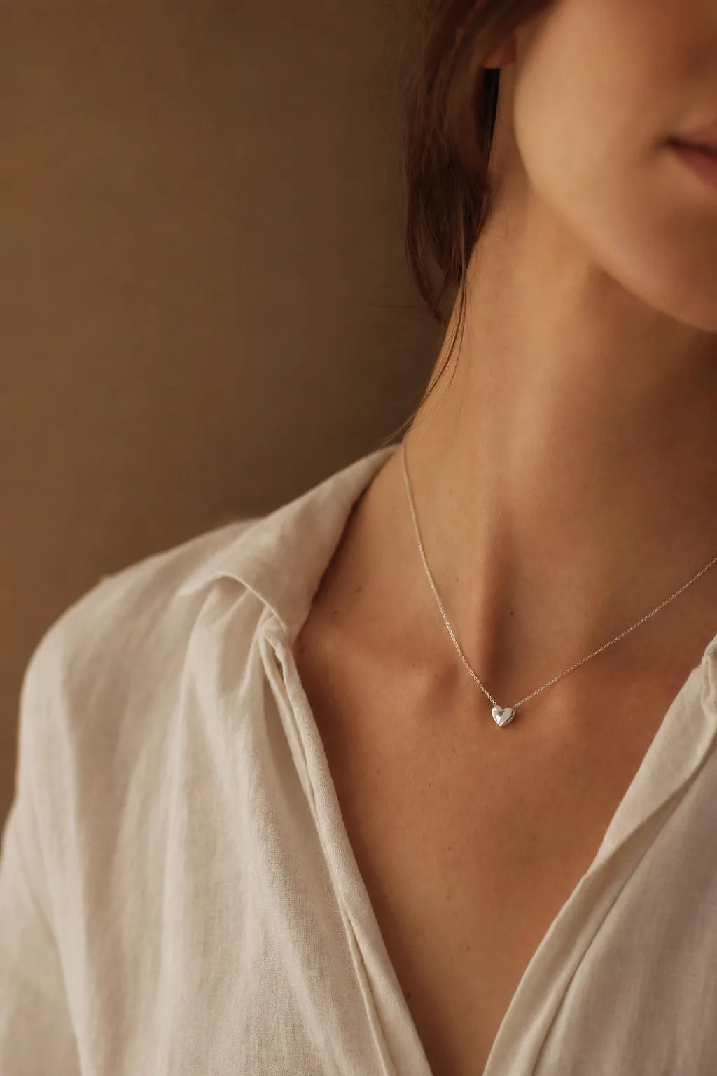 IfShe personalised silver heart pendant necklace worn close to the heart