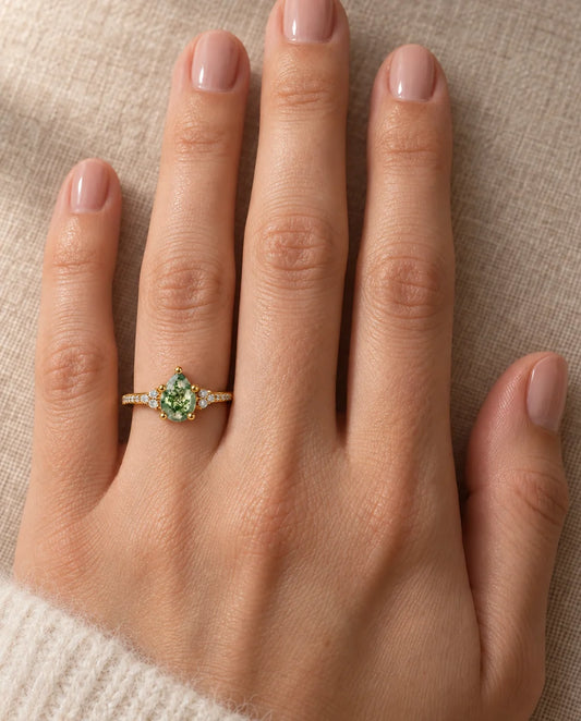 Pear Shaped Moss Agate Ring - worn on the hand