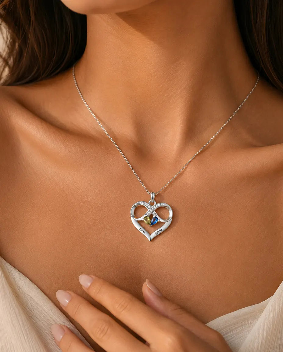 Woman wearing the personalised infinity heart birthstone necklace