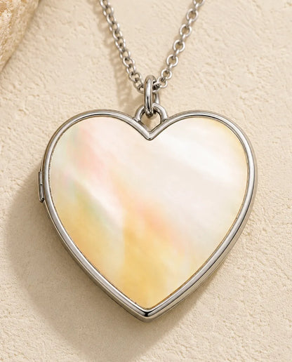 Mother of pearl back panel of the Love heart photo locket necklace