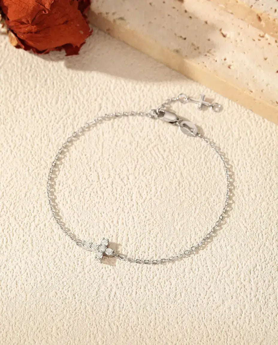Moissanite cross charm bracelet in 925 sterling silver