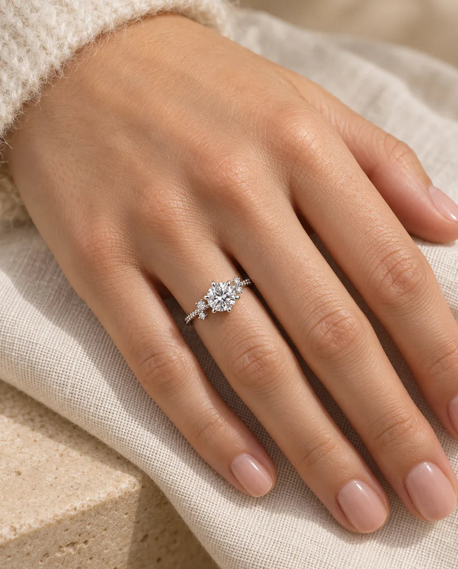 Moissanite Engagement Ring - worn on the hand, close-up