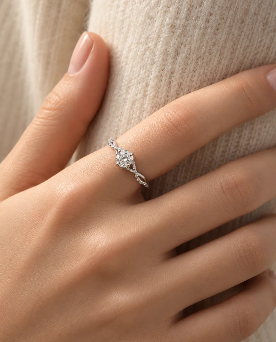 Moissanite Engagement Ring - worn on the hand, close-up