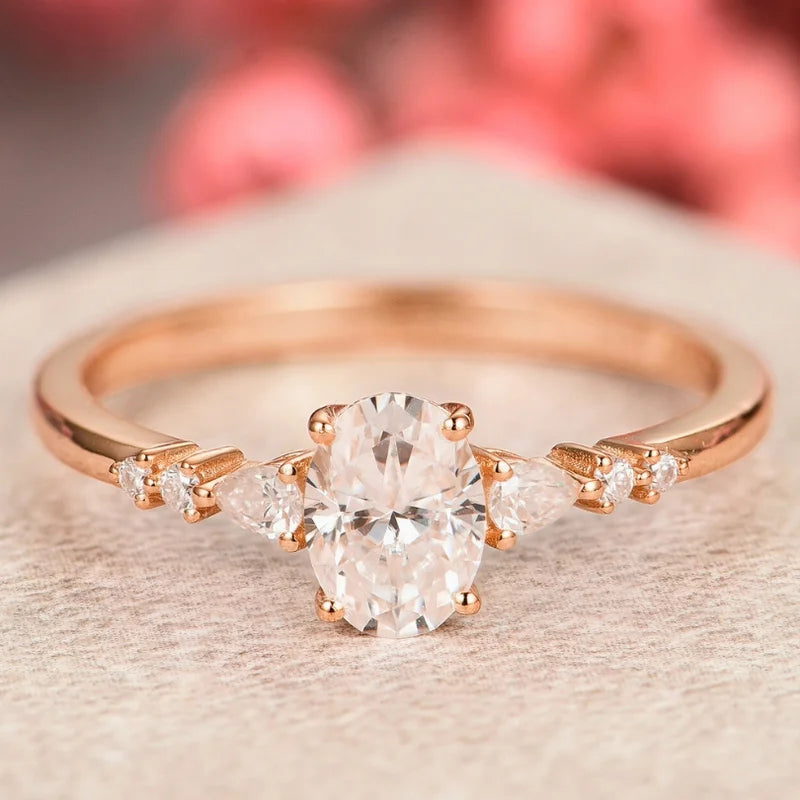 Oval wedding 2025 rings rose gold