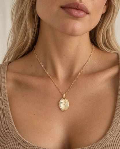Personalised Moon & Star Oval Photo Locket Necklace That Holds 2 Pictures worn on a model