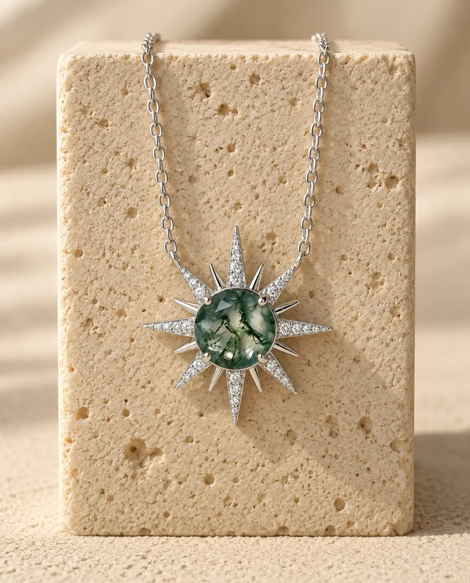 Moss Agate Necklace - displayed on a travertine block