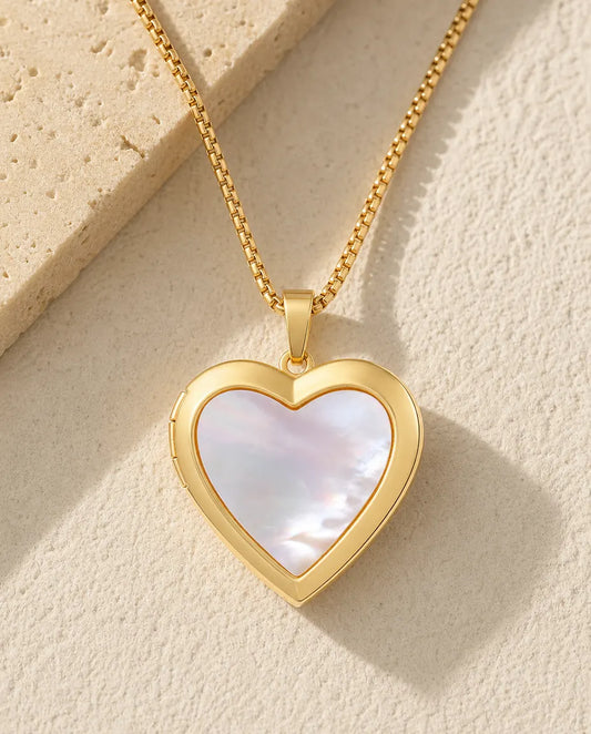Gold heart photo locket necklace faced with one piece of white mother of pearl