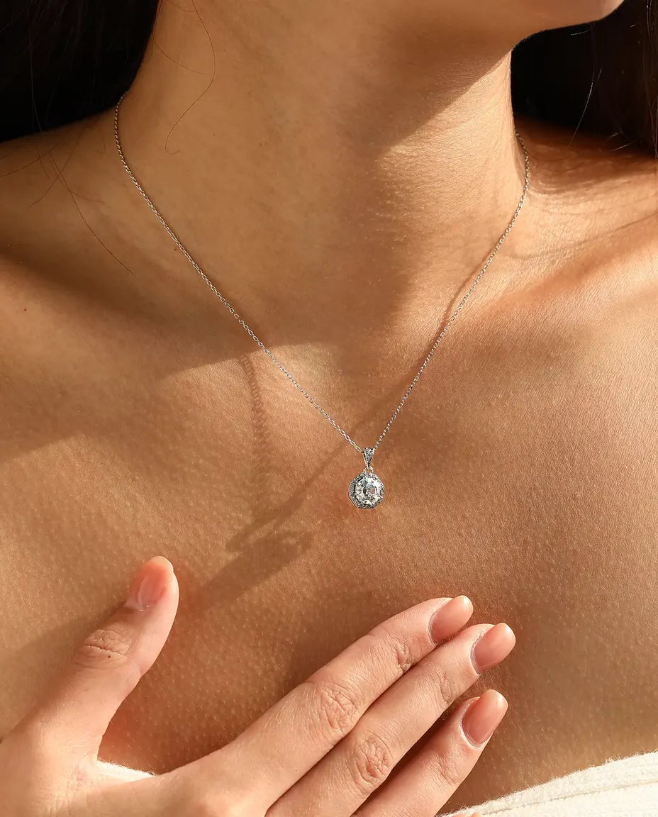 Octagon halo pendant necklace in 925 sterling silver with a step cut clear stone