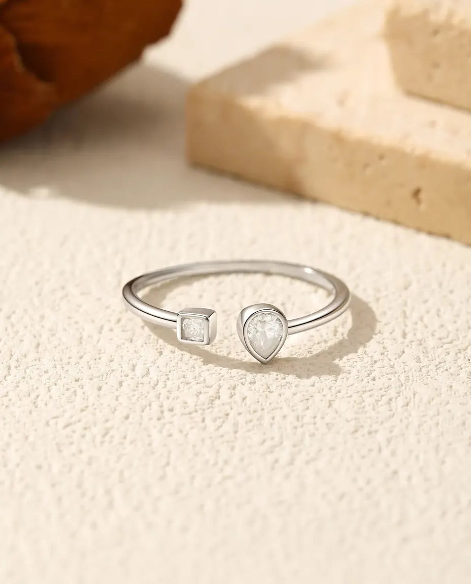 Open cuff pear moissanite ring in 925 sterling silver