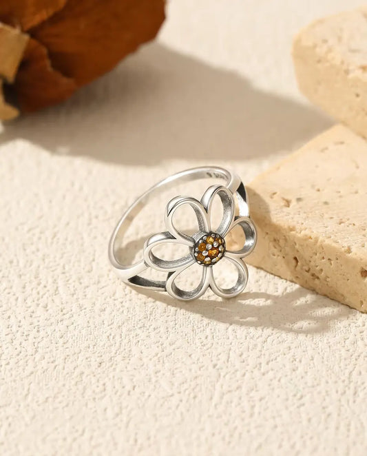 Open flower ring with orange zirconia centre in 925 silver
