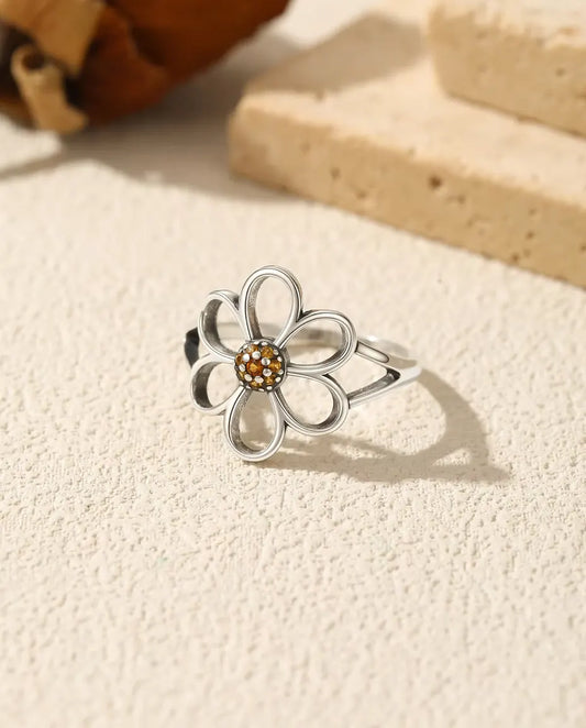 Open flower ring with orange zirconia centre in 925 silver