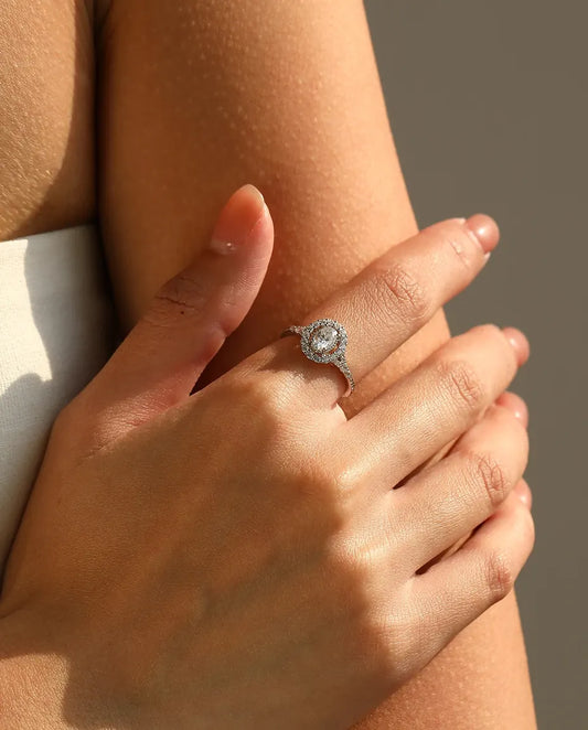Oval halo moissanite engagement ring in 925 sterling silver