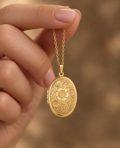 Personalised Oval Photo Locket Necklace That Holds 2 Pictures held in hand