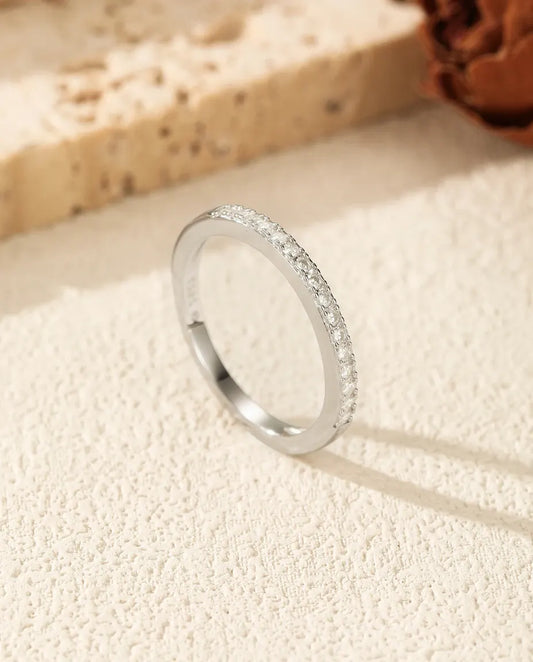 Pavé moissanite wedding band in 925 sterling silver with round D colour stones