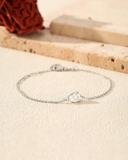 Pear cut moissanite bracelet in 925 sterling silver on a dainty chain