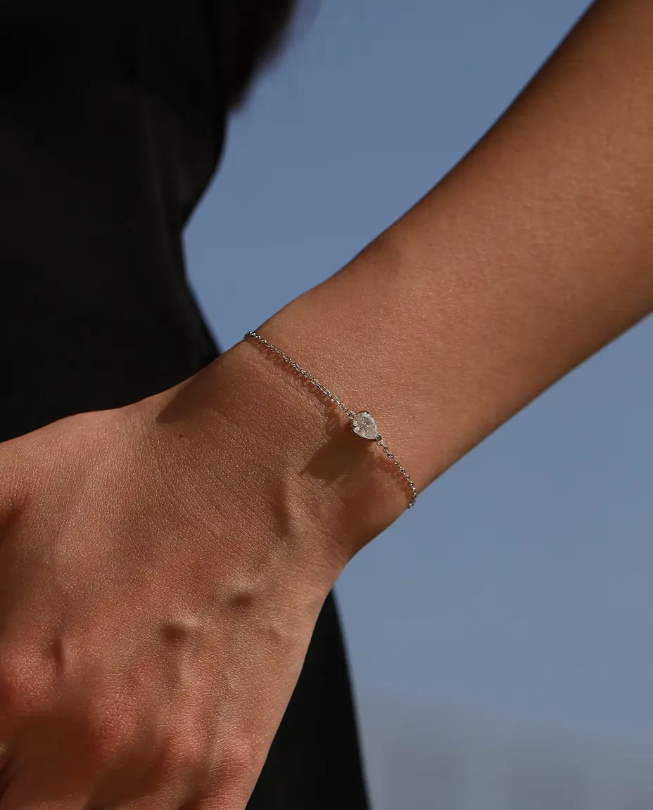 Pear cut moissanite bracelet in 925 sterling silver on a dainty chain