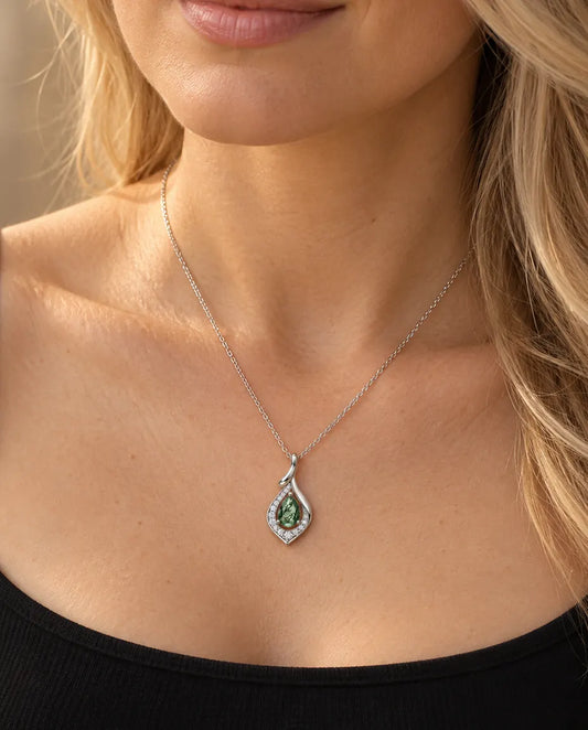 Pear Moss Agate Pendant Necklace in 925 Sterling Silver - worn on a model, close-up at the collarbone