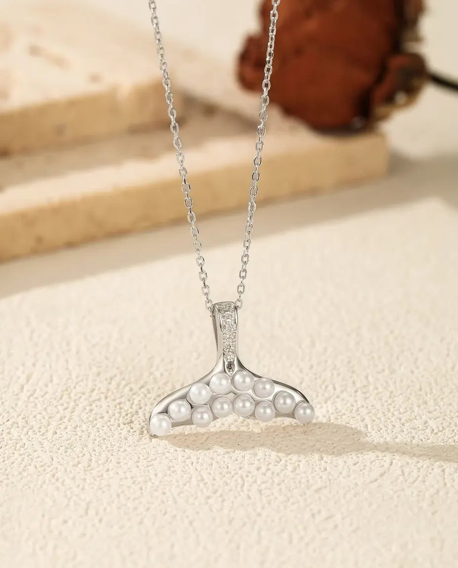 Whale tail necklace with pearl white beads in 925 sterling silver